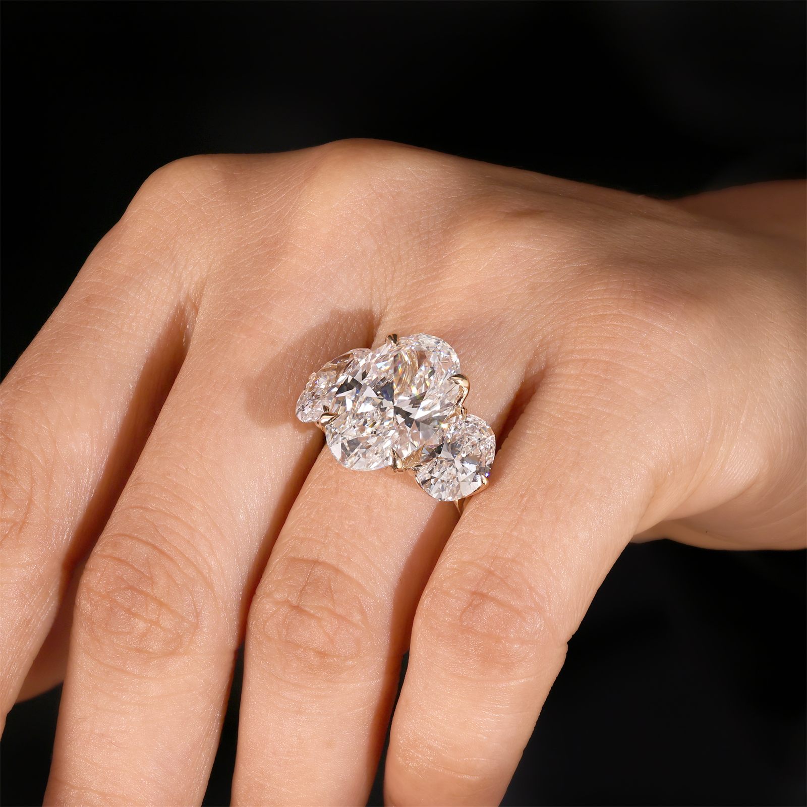 An oval laboratory-grown diamond ring on the hand