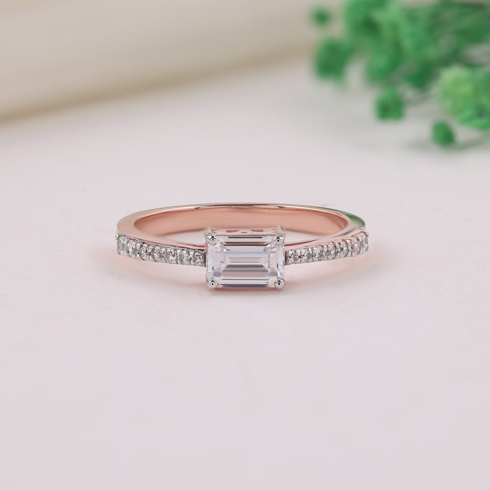 Emerald-Cut Laboratory-Grown Diamond East-West Pavé Engagement Ring, 0.69 ct total, photographed sample in 14K rose gold with white-plated head, claws and pavé settings, front view