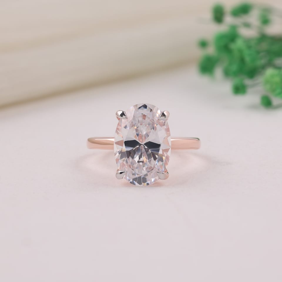 Oval Laboratory-Grown Diamond Hidden Heart Solitaire Engagement Ring, 4.00 ct, photographed sample in 14K rose gold with white-plated claw tips, front view